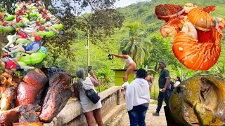 Cooking at the Old Spanish Bridge River in ocho rios female Jumping off the Bridge