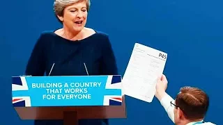 Comedian Pranks Theresa May, Hands Her Walking Papers