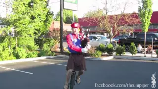 Mario Rides a Unicycle in Portland while playing Super Mario World on Bagpipes - The Unipiper