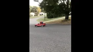 Little Boy Drifting With His Toy Mustang