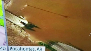 Dumb Driver. Risks life driving through flooded roadway.