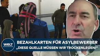 ASYLPOLITIK: Bayern führt Bezahlkarte für Flüchtlinge ein - Hubert Aiwanger verfolgt damit ein Ziel