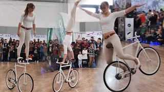 The girl is very good at cycling  , Girl Biker Performs , You Must See