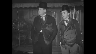 Laurel & Hardy - Maybe it fell down the grating