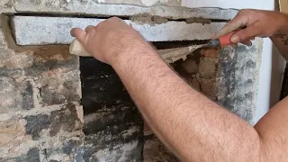 Part 2 of the fireplace videos fitting concrete lintel for fireplace and replacing a few bricks.