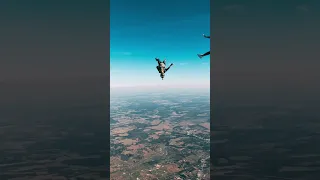 Awesome girls flying head down towards earth