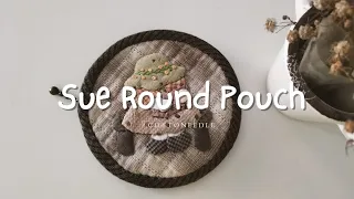 Sue Round Pouch