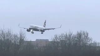 British Airways Airbus A320-232 (One World livery) landing an a very blustery Belfast