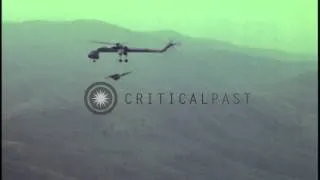 A CH-54 helicopter transporting artillery from US Army 101st  Airborne FSB, Geron...HD Stock Footage