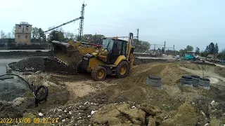 caterpillar 428 trench backfilling