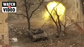 Footage shows Russian tank firing at Mariupol building