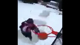 DUNKING A BASKETBALL ON ICE SKATES