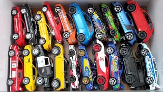 Box full off model cars,hummer police,Honda civic,fiat,Mercedes AMG Gt63,Defender,Bugatti vayron