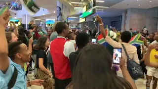 Shosholoza erupts in celebration as World Cup winners arrive home in South Africa with Siya Kolisi