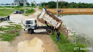 The Best Team KOMATSU D31P & D20P Open New Project !! Trucks 5T & Bulldozer Pushing Stone Into Water