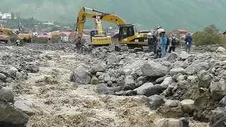 At least 14 people killed in Bolivia landslides