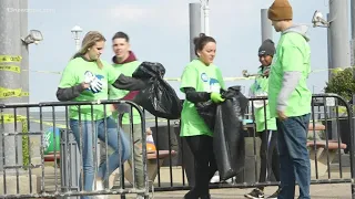 Volunteers help clean up trash at the Oceanfront on Earth Day