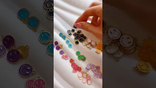 Organizing all my smiley face charms 😊