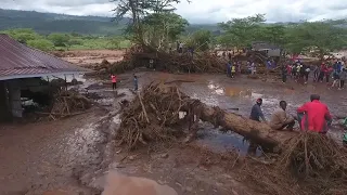 Dozens of people die in western Kenya as floodwaters sweep away houses and cars