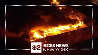 Massive warehouse fire burning in Elizabeth, New Jersey