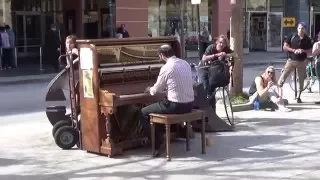 Tom Brier plays piano in downtown Santa Cruz