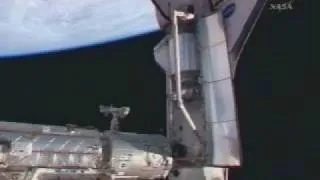 STS-122 Crew Enters Space Station