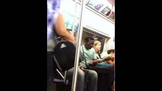 Keanu Reeves rides the subway and gives up his seat