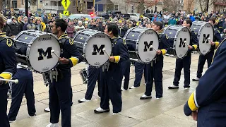 Michigan drumline and marching band exiting revelli hall. #uofm #marchingband #michiganfootball