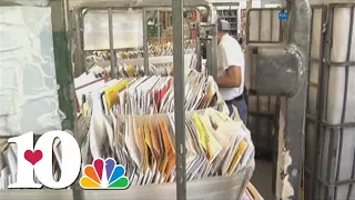 Mail carriers pushing through 'peak season' as more people send mail for the holidays