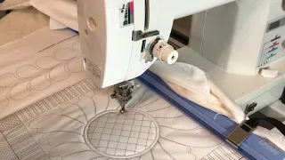 QUILTING ON A SKILL BUILDER PANEL ON  A CUTIE FRAME WITH PQ1500S