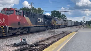 8/21/22 - CN Ore train with CN (ex Citirail) ES44AC trailing through Carbondale, IL
