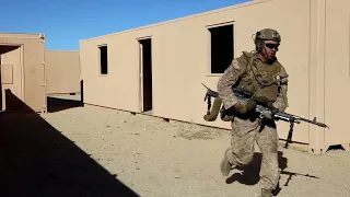 Marines with Combat Engineer Battalion defend an urban environment during AFX 5-23