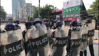 Riot police face off against protesters in Myanmar anti coup protest