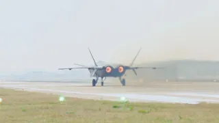 China's J-20 fighters escort aircraft carrying soldier remains to show the highest respect