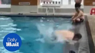 OUCH! Man hits swimming pool edge with face in backflip fail