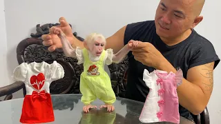 Monkey Luk surprise when dad bought new clothes