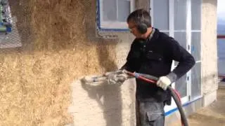 Strawbale plastering.