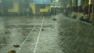 "Immersive Heavy Rainfall Outside the Grand Building"