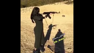 شاهد امرأة عراقية ترمي بسلاح كلاشنكوف