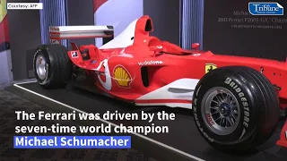 Schumacher Ferrari fetches record $13M at auction