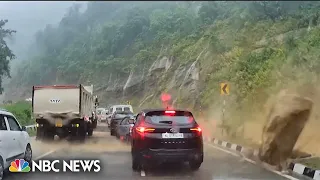 Video shows rock crush cars in deadly India landslide