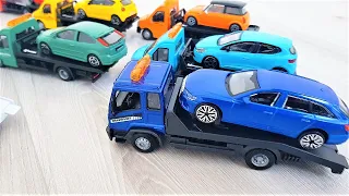 Burago tow truck of various colors 8 pieces