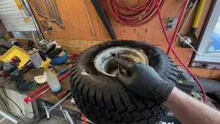 Harbor Freight Mini-Tire Changer changes a lawn tractor tire.