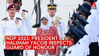 National Day Parade 2023: President Halimah Yacob inspects guard of honour