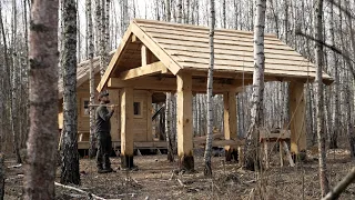 built medieval outdoor workshop from huge hewn logs with ax for my log cabin