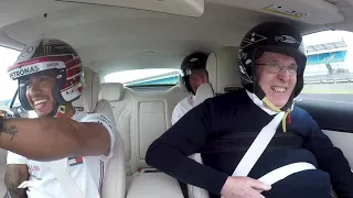 Lewis Hamilton takes Sir Frank Williams for a very special hot lap around Silverstone