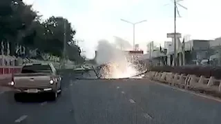 Power lines explode in shower of sparks after truck topples them