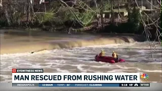 Man rescued from rushing water