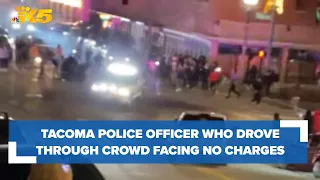 Tacoma police officer caught on video driving car through crowd will not face charges