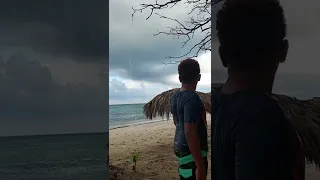 Wow! Tornado forming right before it hits landfall! Unbelievable footage!